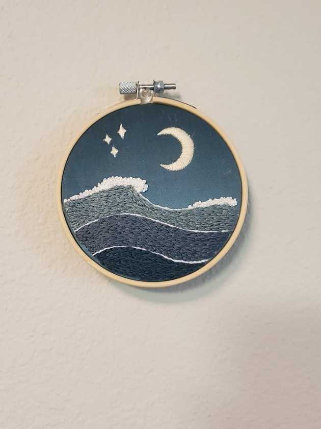 Detailed view of moon embroidery